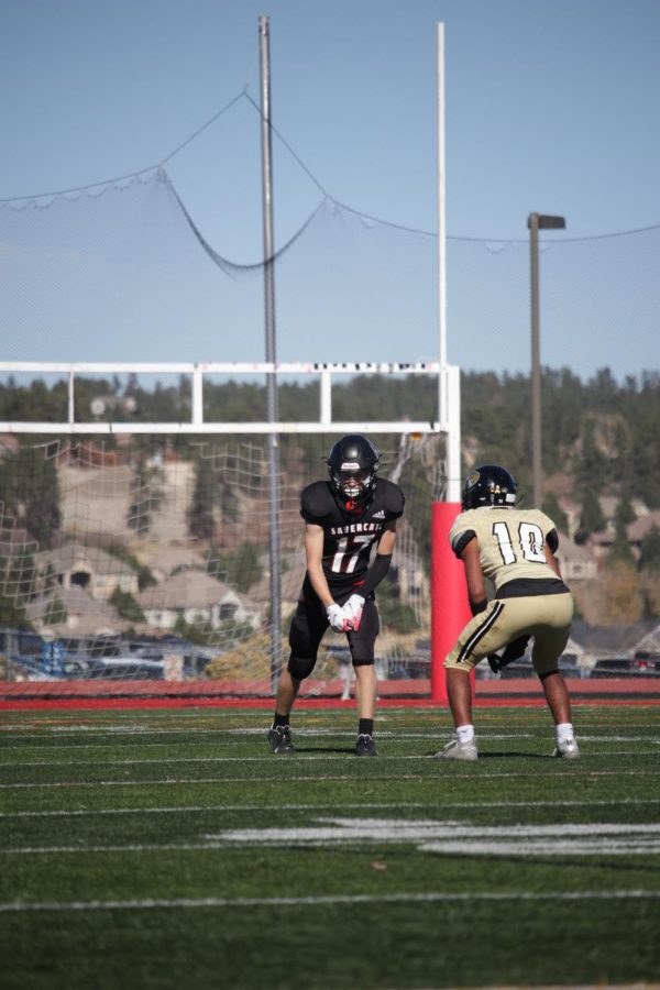 Sophomore Isaac Wiebelhaus lines up as he gets ready to go out for a pass in their game against Rock Canyon High school on Saturday, Oct. 31. The team fought hard but lost by a score of 38-28. “Our team tried our hardest and we tried to come back but couldn’t,” Wiebelhaus said.
