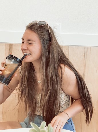 Outfit Options: 
Senior Jocelyn Oceguera drinking boba after a day of classes. After the summer, Oceguera had to organize her wardrobe in a way that fit the school dress code, adjusting to follow them in order to not receive a violation. “I really have to be conscious about making sure my clothes fit me the way the school wants them to,” Oceguera said. 